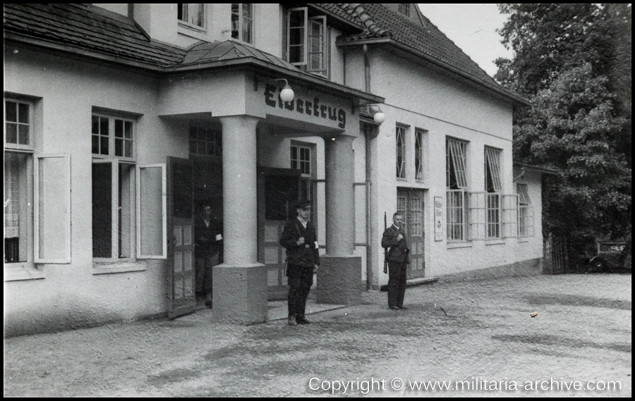Polizei Bataillon 106, Kiel 1939. Men of Pol.Btl.106 wearing Hilfspolizei armbands at Eiderkrug am Schulensee, Hamburger Chaussee 349, Kiel, Germany (building later used by Pol.Btl.103).