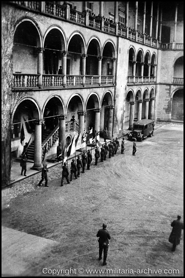 Polizei Bataillon 106, 9.Komp, Krakau, Wawel Castle, Poland May 19th 1940. German soldiers carrying the 430-year-old flags, which the German Order of Knights lost in the battle of Tannenberg July 15, 1410, against a twice as large Slav force.